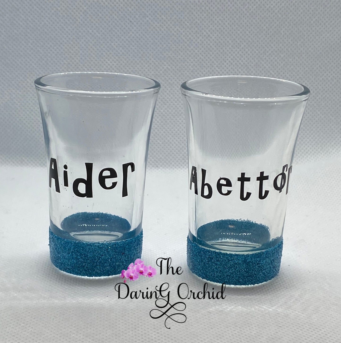 Set of 2 Aider and Abettor shot glasses