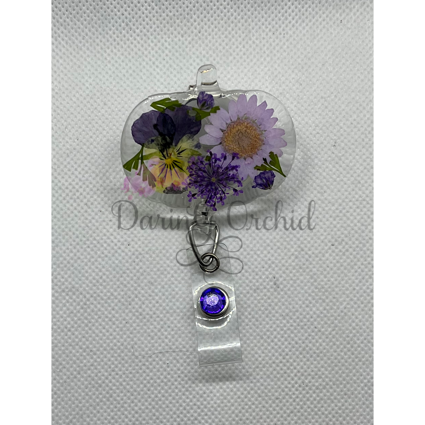 Dried flowers badge reel, pumpkin shape, purple flowers