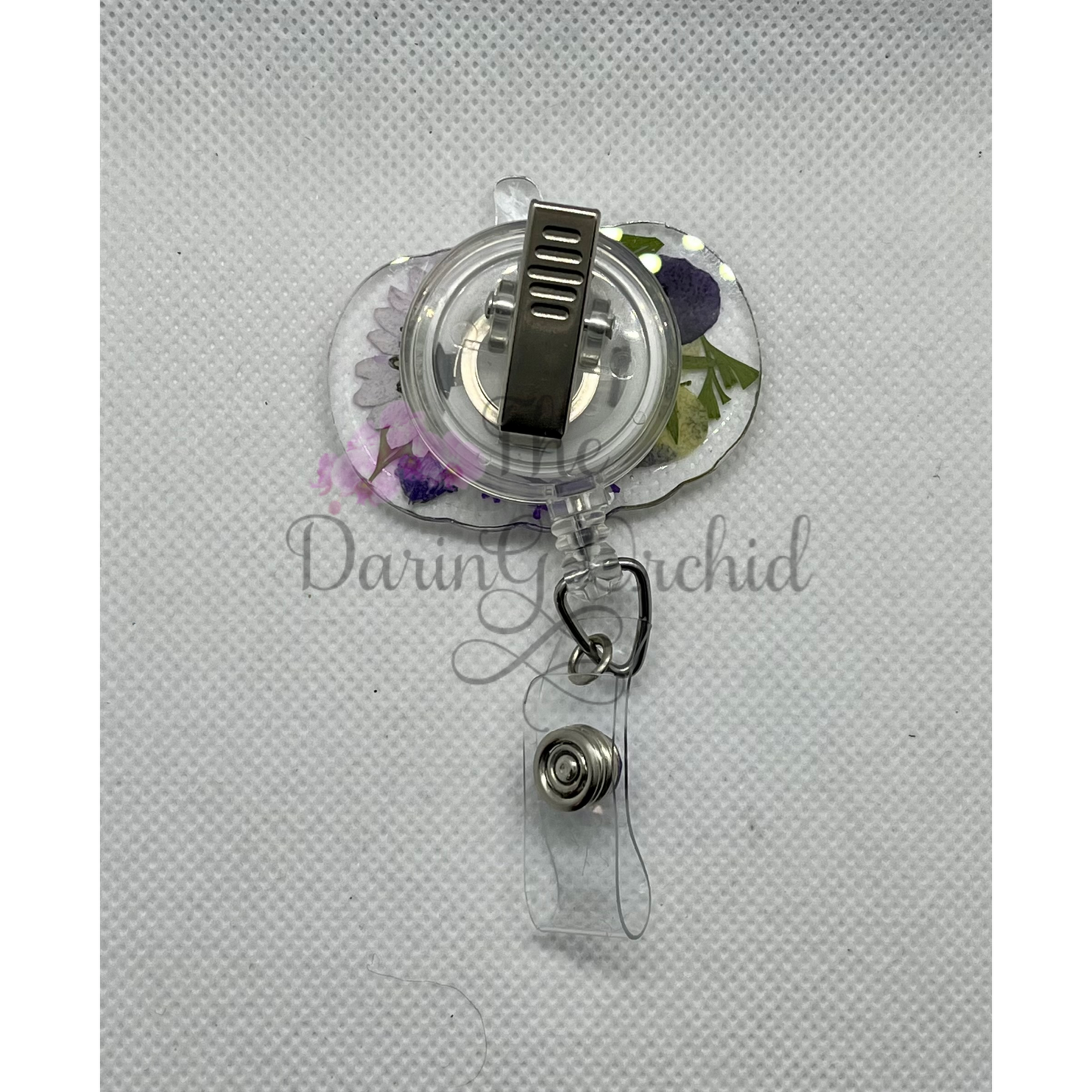 Dried flowers badge reel, pumpkin shape, purple flowers