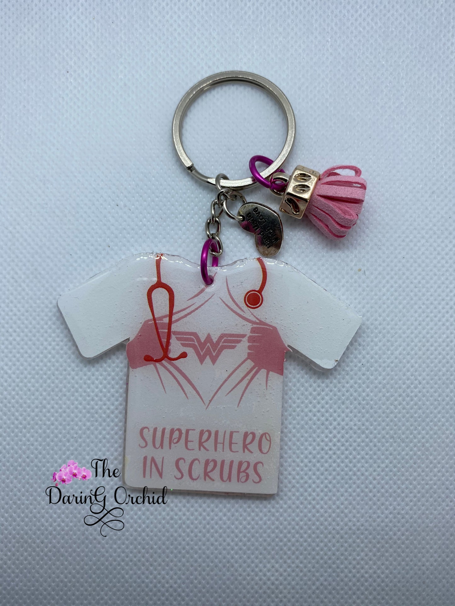 Superhero in scrubs shirt keychain Pink